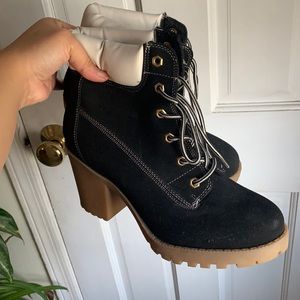Black heeled hiking boot-style booties